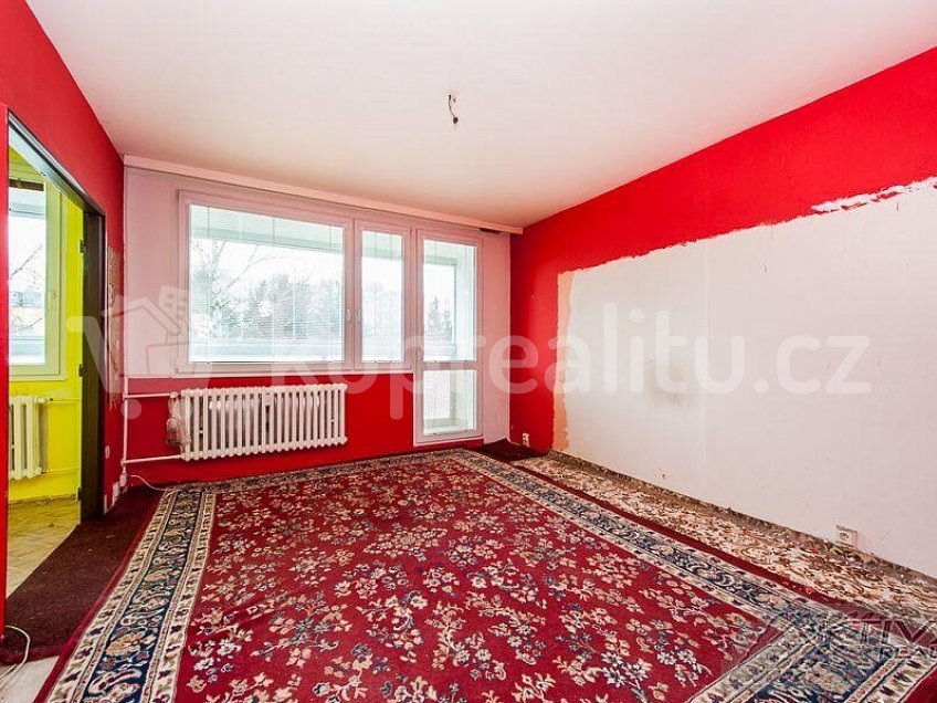 Prodej bytu 3+1 65 m^2 Praha 8 18100