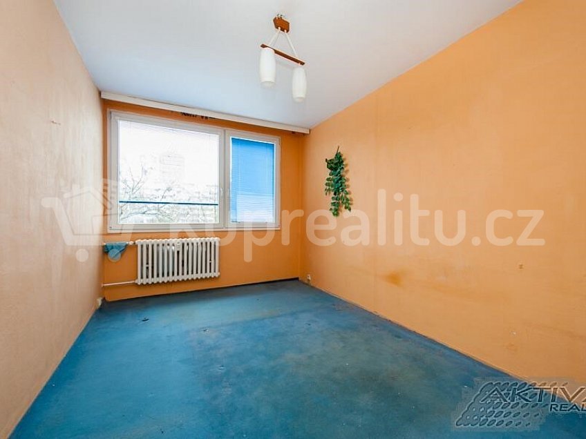 Prodej bytu 3+1 65 m^2 Praha 8 18100