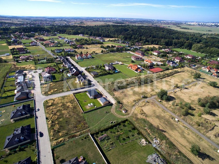 Prodej  stavebního pozemku 1650 m^2 Ibišková, Jesenice 