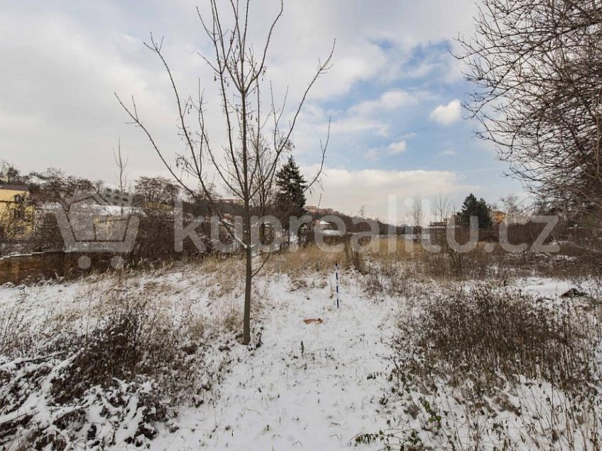 Prodej  stavebního pozemku 1193 m^2 Okrouhlická, Praha 