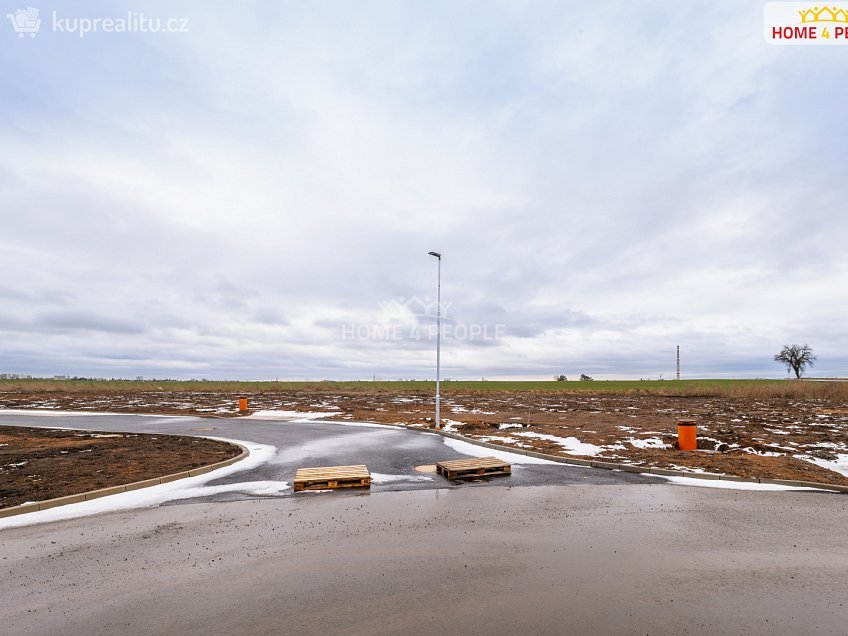 Prodej  stavebního pozemku 1000 m^2 Sněžná, Veleň 