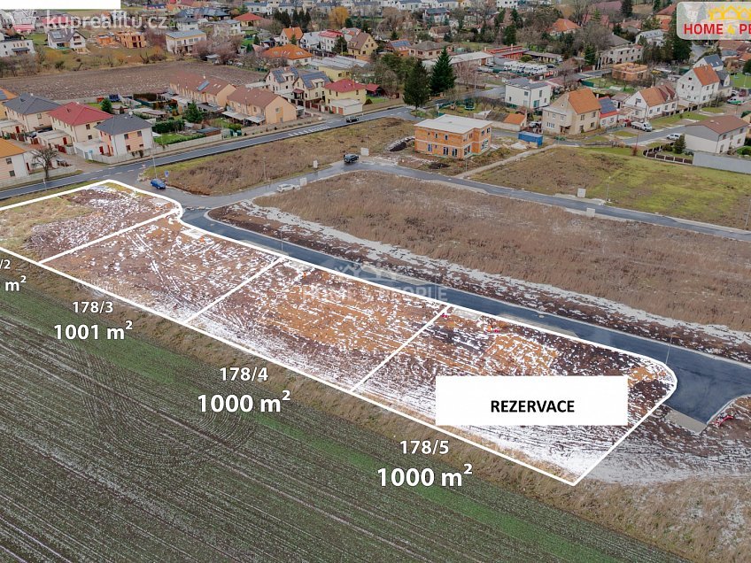 Prodej  stavebního pozemku 1000 m^2 Sněžná, Veleň 