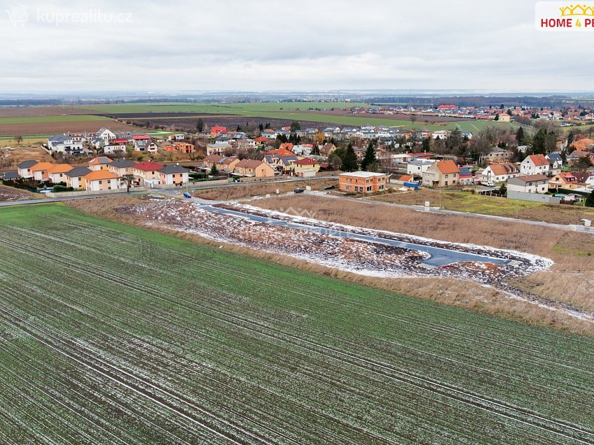 Prodej  stavebního pozemku 1000 m^2 Sněžná, Veleň 