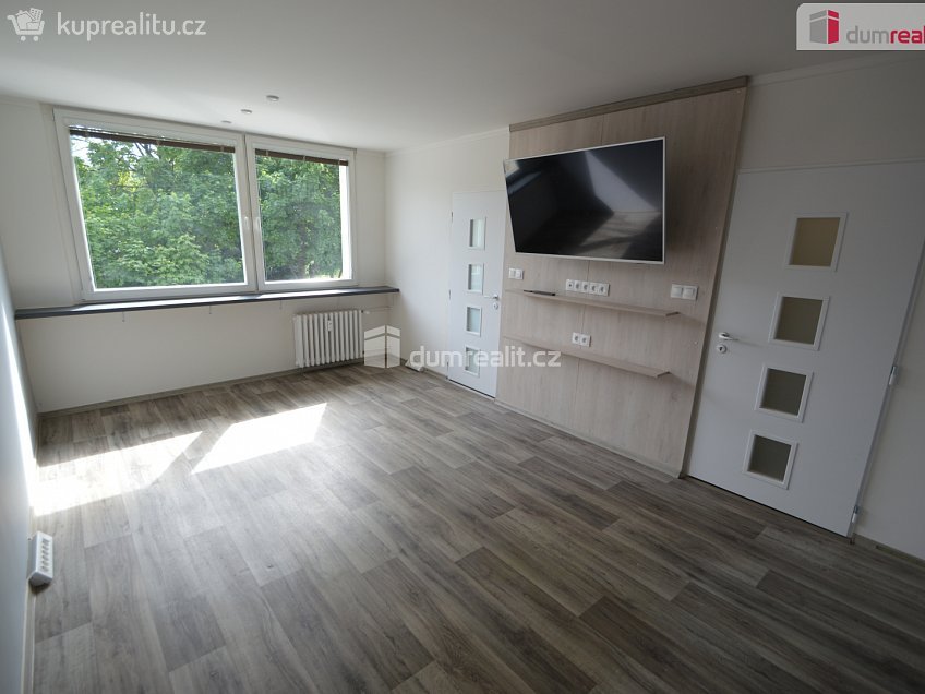 Prodej bytu 4+1 76 m^2 Na hájku, Praha 8 