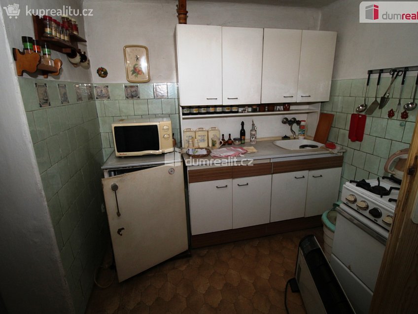 Prodej  rodinného domu 60 m^2 Holenická, Praha 19 