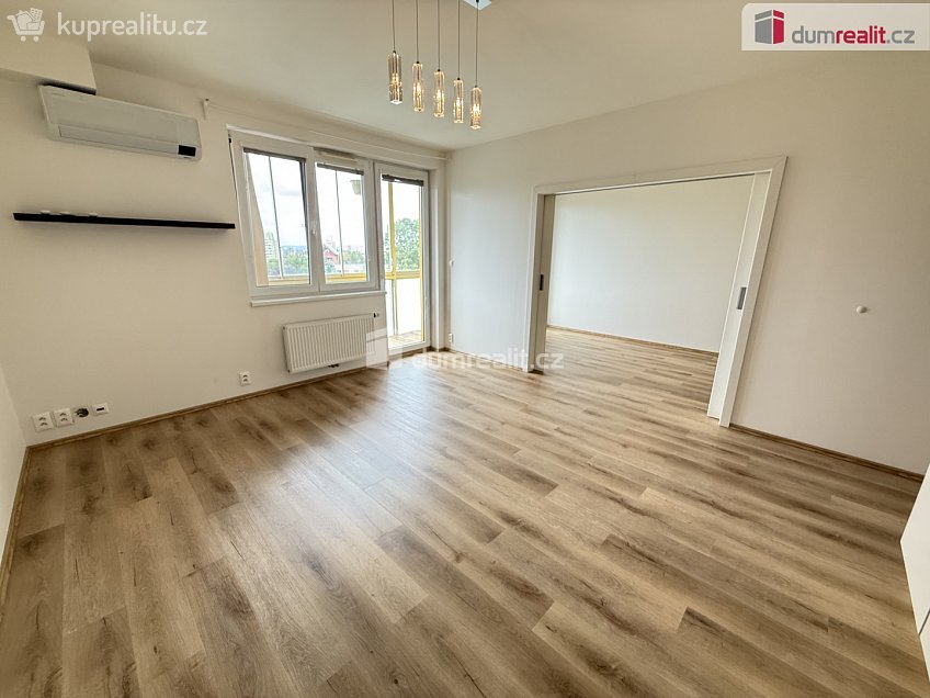 Pronájem bytu 3+kk 70 m^2 Březenská, Praha 8 