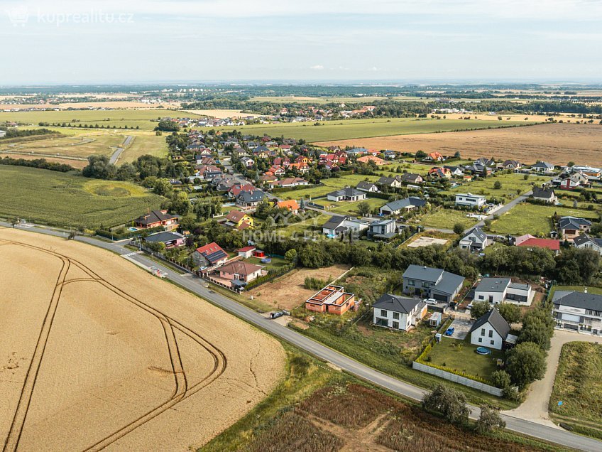 Prodej  stavebního pozemku 1133 m^2 K Polníku, Křenice 