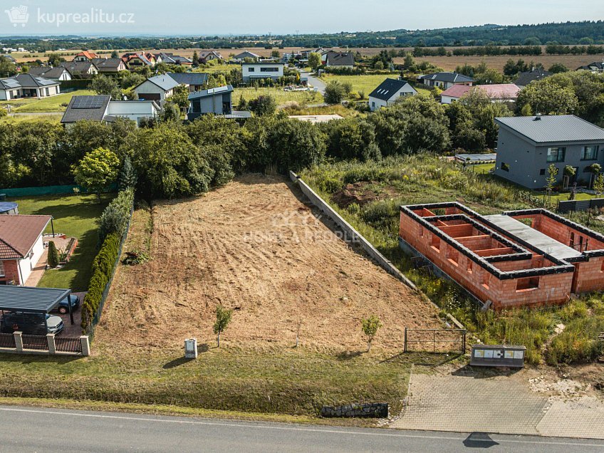 Prodej  stavebního pozemku 1133 m^2 K Polníku, Křenice 