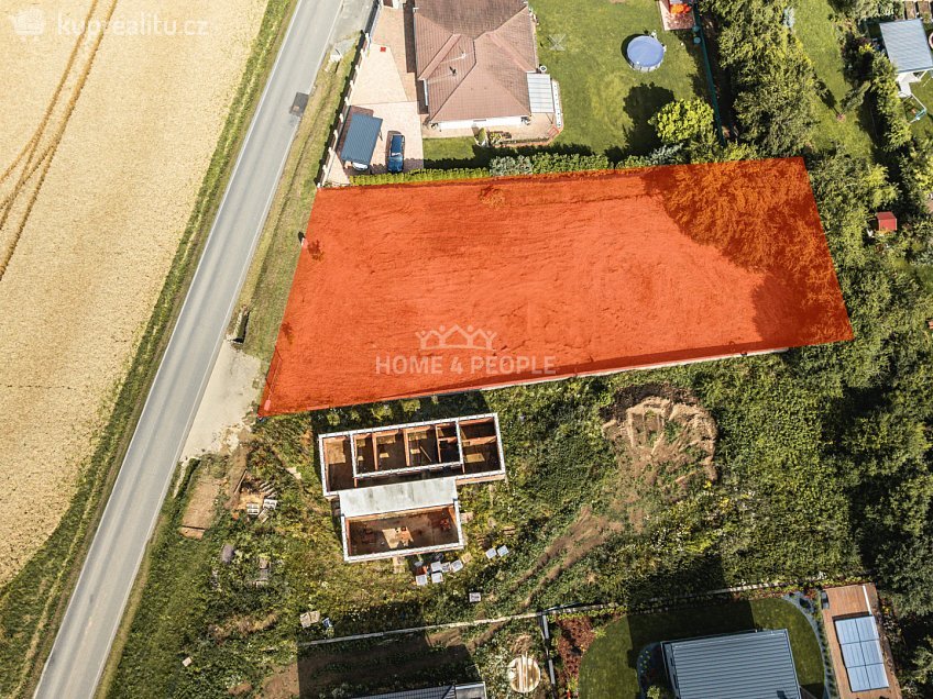 Prodej  stavebního pozemku 1133 m^2 K Polníku, Křenice 