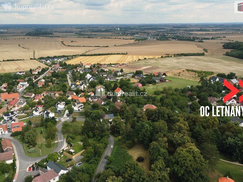 Prodej  stavebního pozemku 1067 m^2 Hlavní, Panenské Břežany 