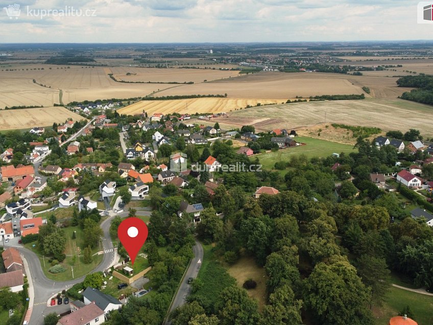 Prodej  stavebního pozemku 1067 m^2 Hlavní, Panenské Břežany 