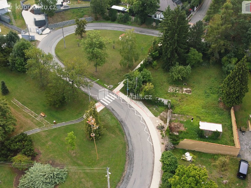 Prodej  stavebního pozemku 1067 m^2 Hlavní, Panenské Břežany 