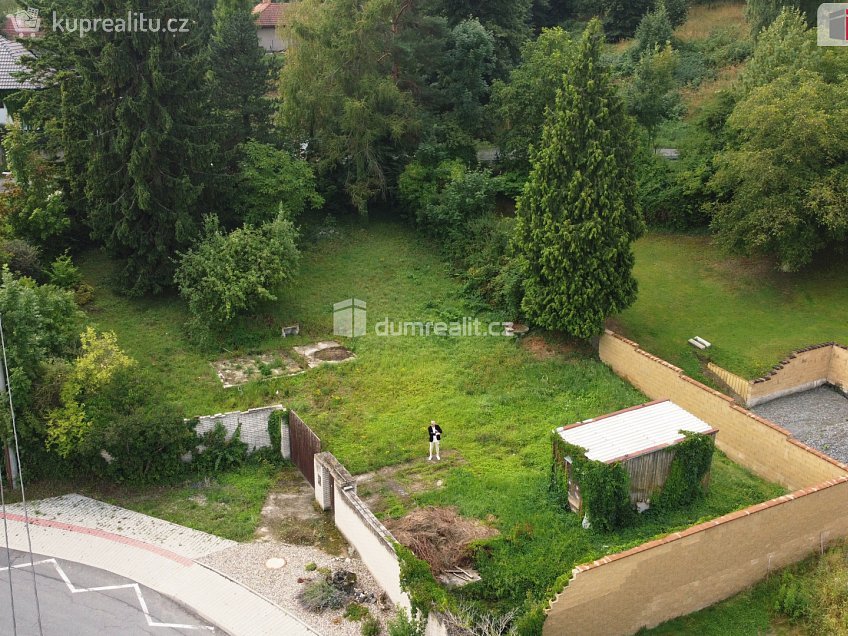 Prodej  stavebního pozemku 1067 m^2 Hlavní, Panenské Břežany 