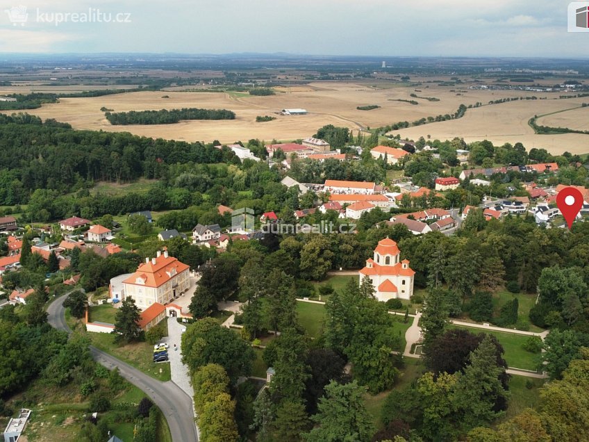 Prodej  stavebního pozemku 1067 m^2 Hlavní, Panenské Břežany 
