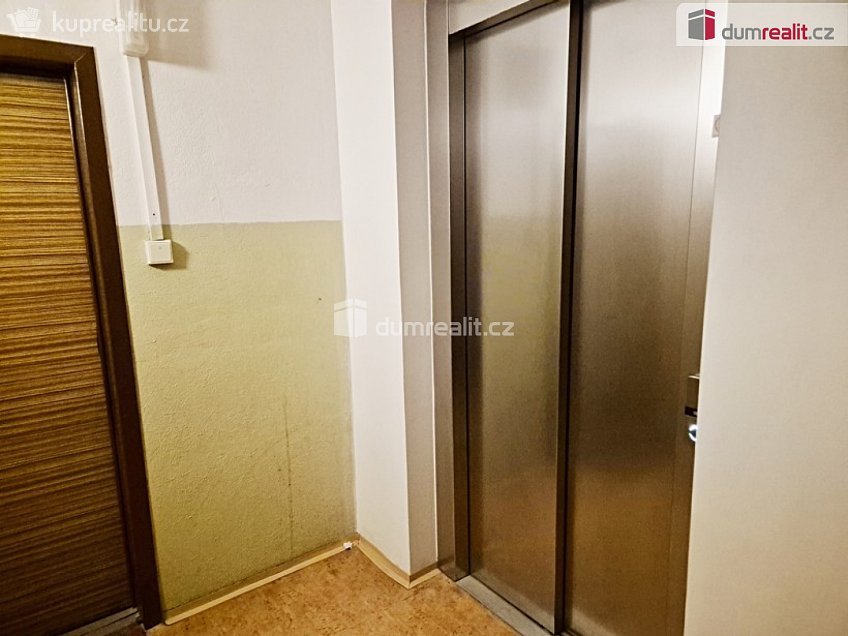 Prodej bytu 1+1 29 m^2 Krynická, Praha 8 