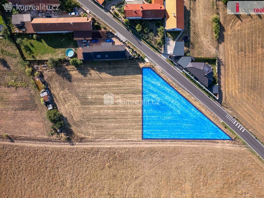 Prodej  stavebního pozemku 1265 m^2 Spomyšl, Spomyšl 