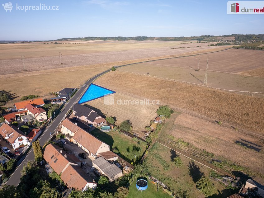 Prodej  stavebního pozemku 1265 m^2 Spomyšl, Spomyšl 