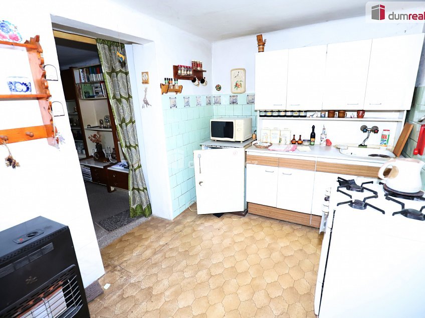 Prodej  rodinného domu 60 m^2 Holenická, Praha 19 