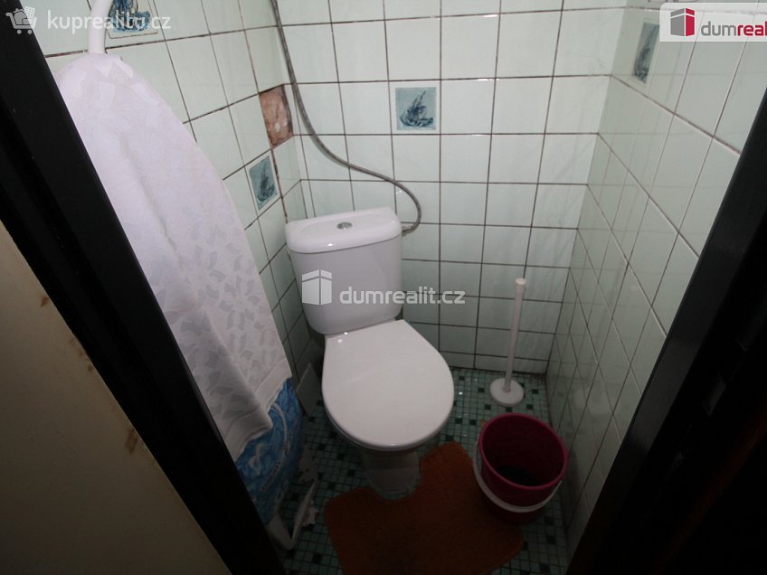 Prodej  rodinného domu 60 m^2 Holenická, Praha 19 