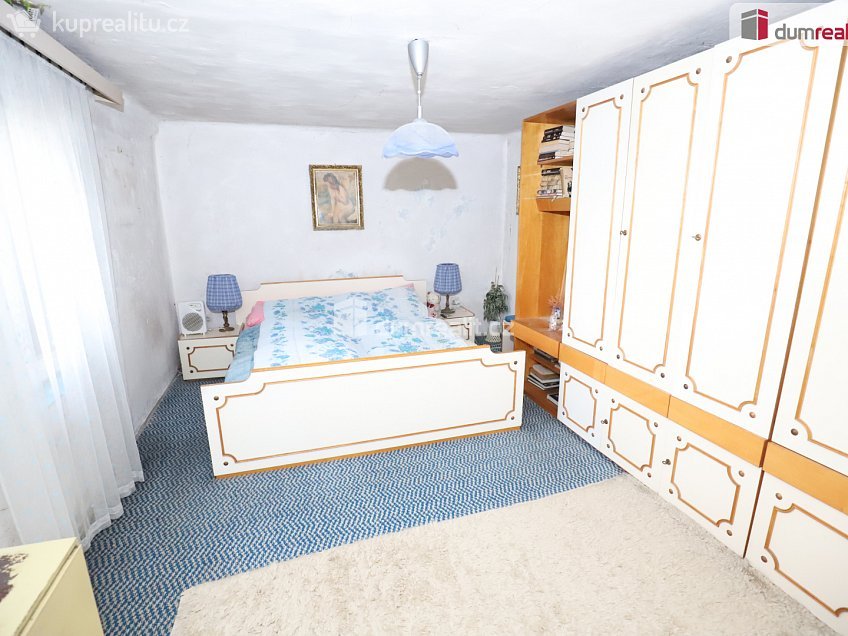 Prodej  rodinného domu 60 m^2 Holenická, Praha 19 