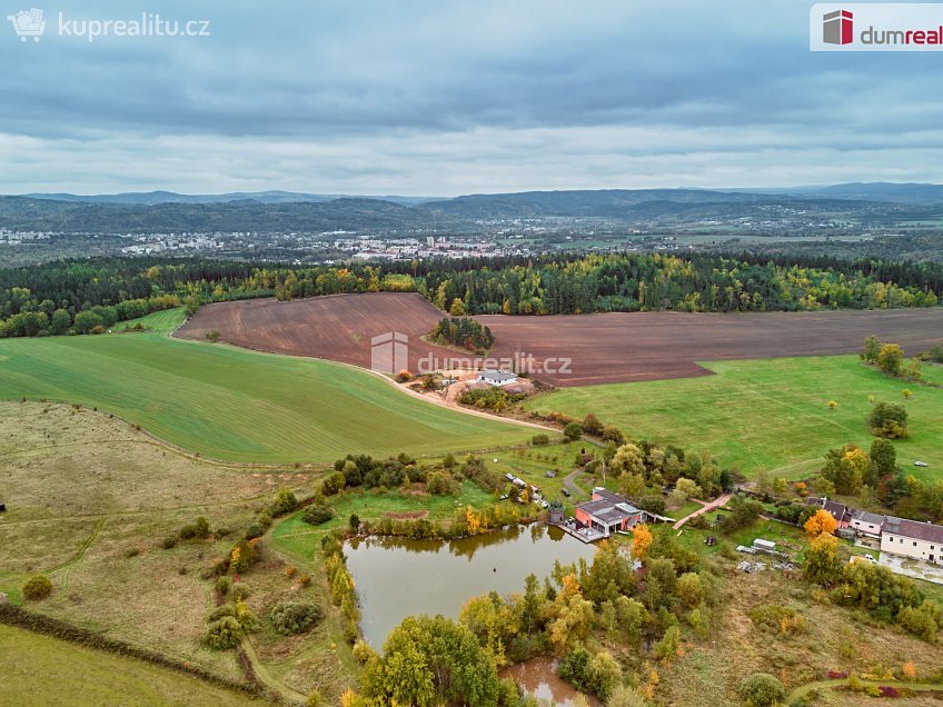 Prodej  stavebního pozemku 1427 m^2 Nová Role, Nová Role 