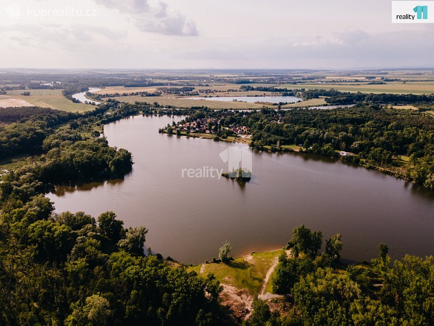Prodej  rodinného domu 125 m^2 V průhonu, Zvěřínek 