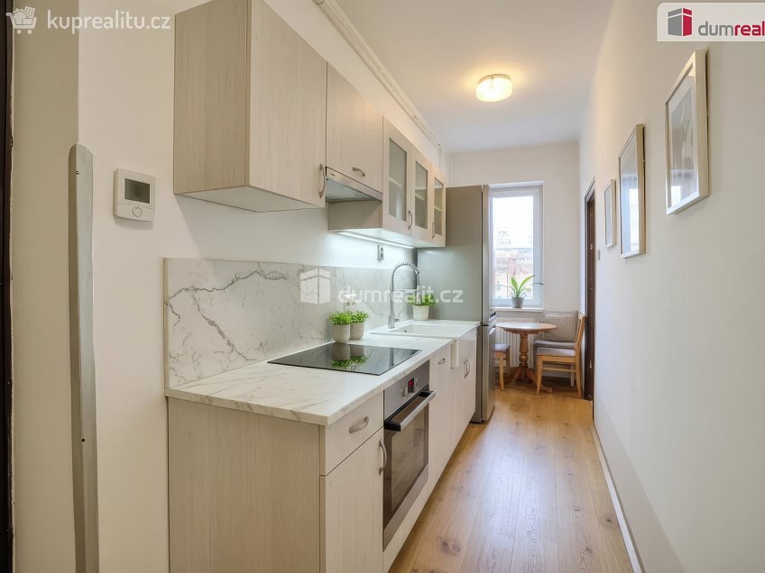 Prodej bytu 2+kk 53 m^2 U Zahrádek, Libiš 