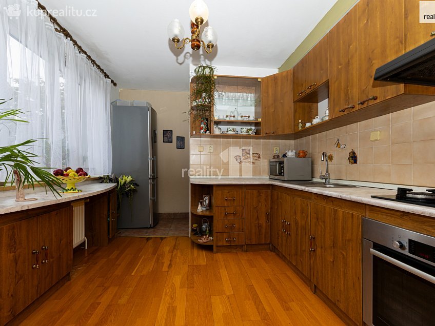 Prodej bytu 3+kk 151 m^2 Kamýcká, Praha-Suchdol 