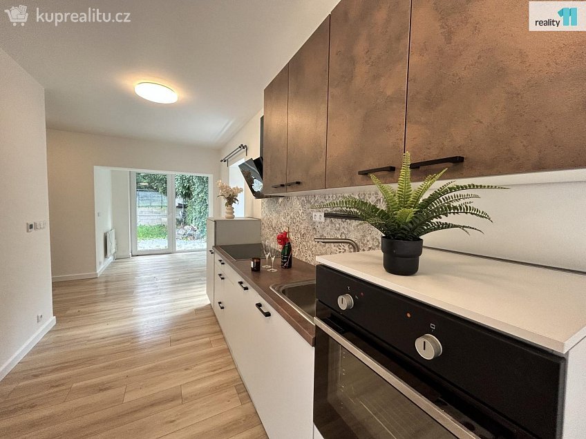 Prodej  rodinného domu 94 m^2 K Dubovému mlýnu, Praha 6 