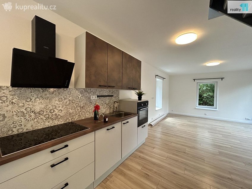 Prodej  rodinného domu 94 m^2 K Dubovému mlýnu, Praha 6 