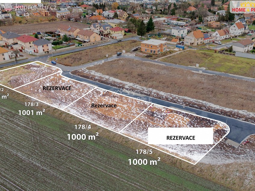 Prodej  stavebního pozemku 1000 m^2 Západní, Veleň 
