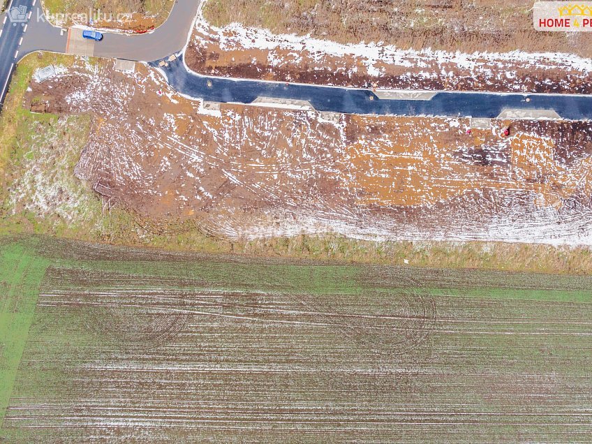 Prodej  stavebního pozemku 1000 m^2 Západní, Veleň 