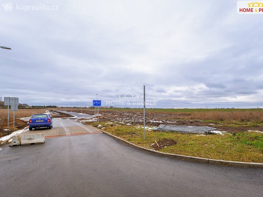 Prodej  stavebního pozemku 1000 m^2 Západní, Veleň 