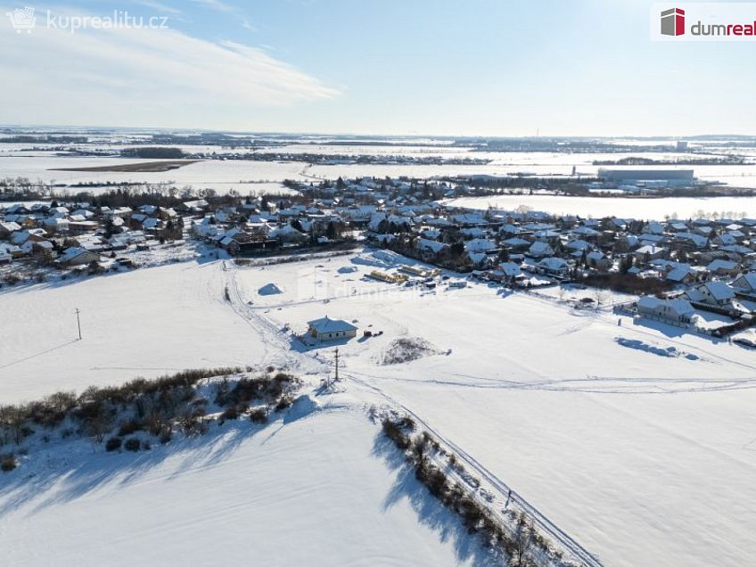 Prodej  stavebního pozemku 1023 m^2 Dubová, Čakovičky 