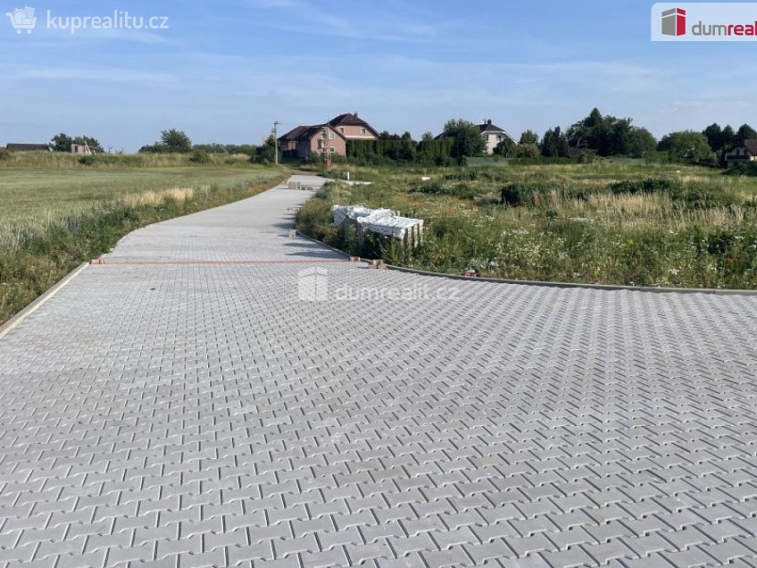 Prodej  stavebního pozemku 1023 m^2 Dubová, Čakovičky 