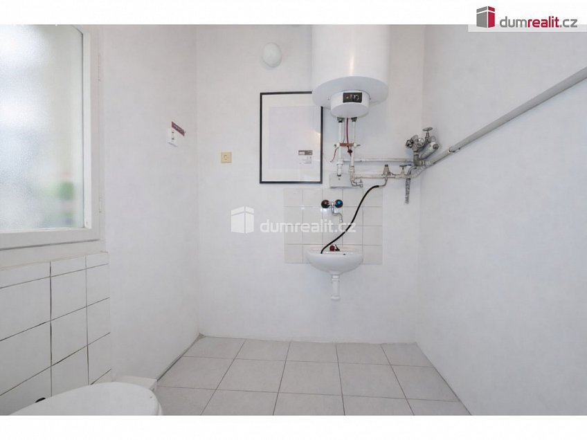 Pronájem  rodinného domu 75 m^2 Na Košíku, Praha 15 