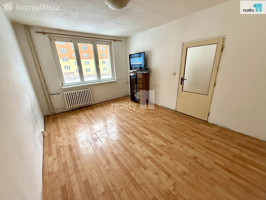 Prodej bytu 1+1 35 m^2 U Koupaliště, Chodov 