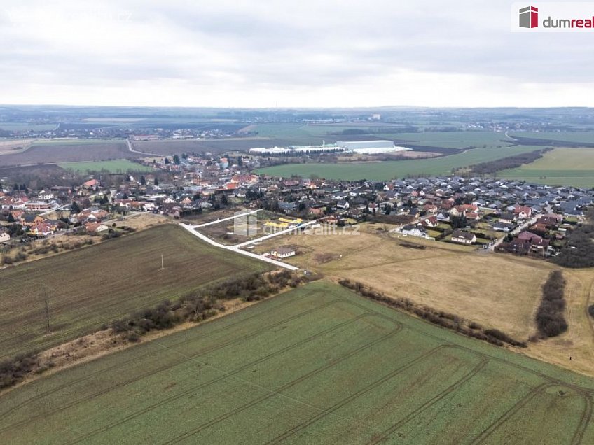 Prodej  stavebního pozemku 1023 m^2 Dubová, Čakovičky 