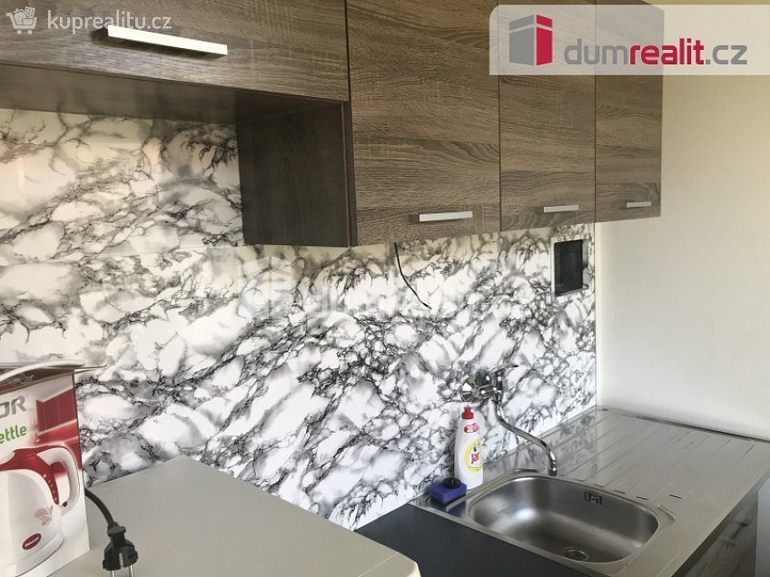 Pronájem bytu 1+1 27 m^2 Veltruská, Praha 9 