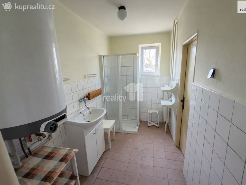 Prodej  rodinného domu 271 m^2 Suchdol, Suchdol 