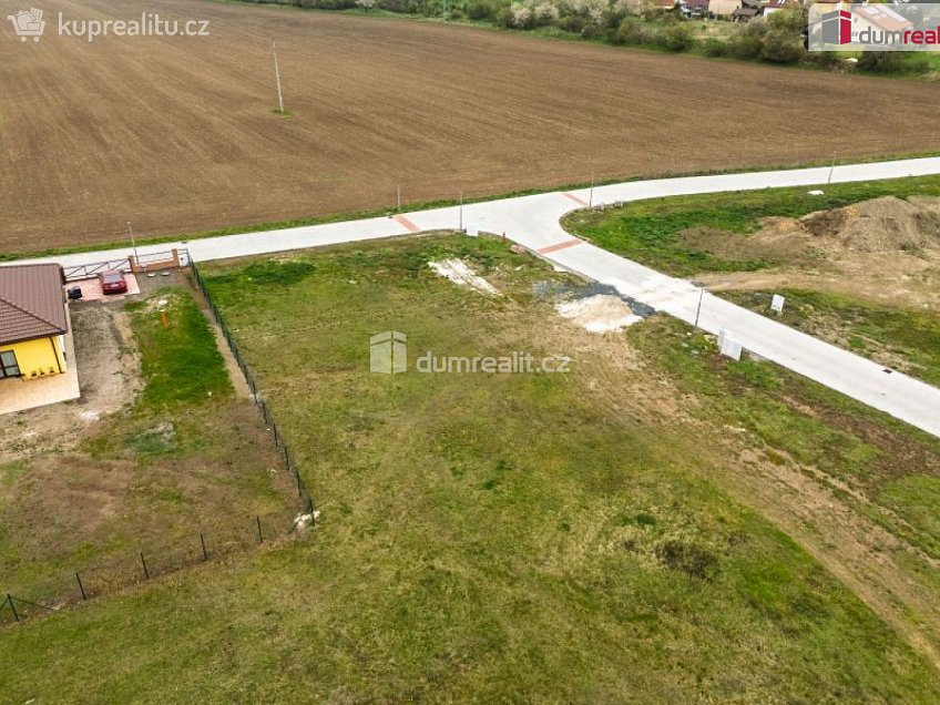 Prodej  stavebního pozemku 1023 m^2 Dubová, Čakovičky 