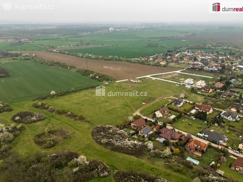 Prodej  stavebního pozemku 1023 m^2 Dubová, Čakovičky 