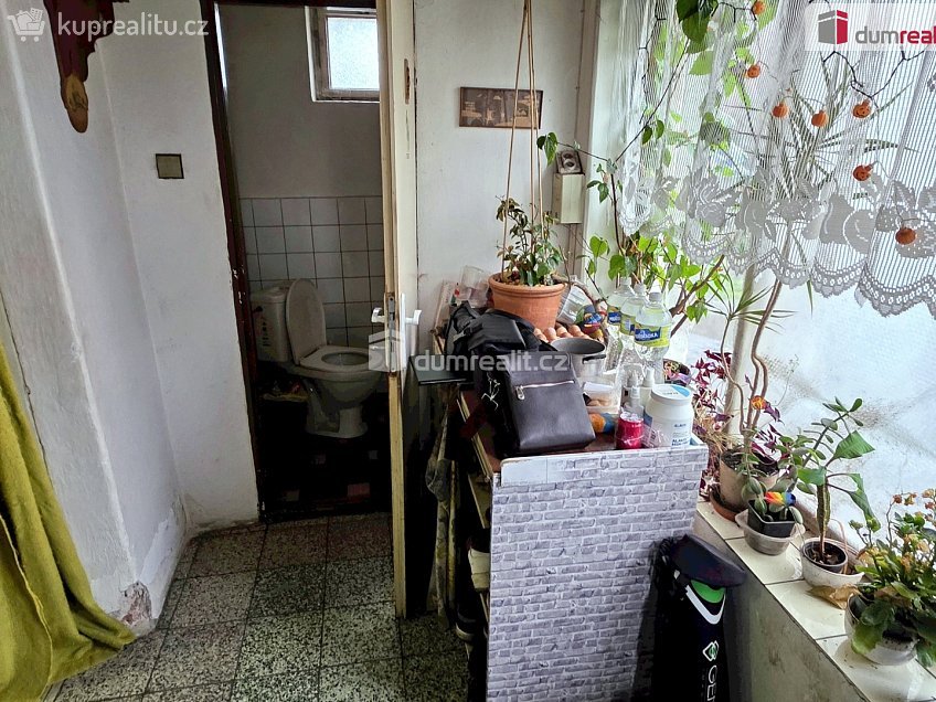Prodej  rodinného domu 106 m^2 Zaříčanská, Praha 21 