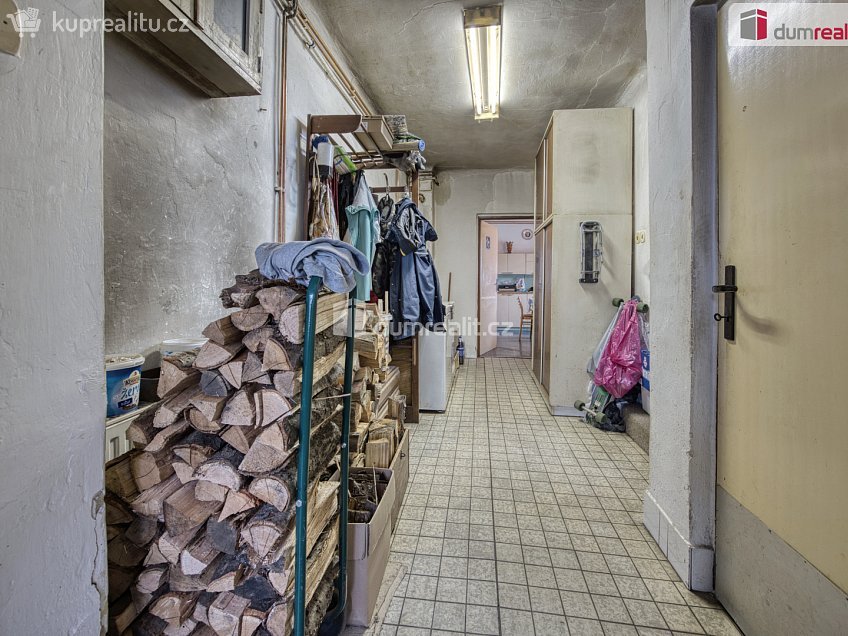 Prodej  rodinného domu 106 m^2 Zaříčanská, Praha 21 