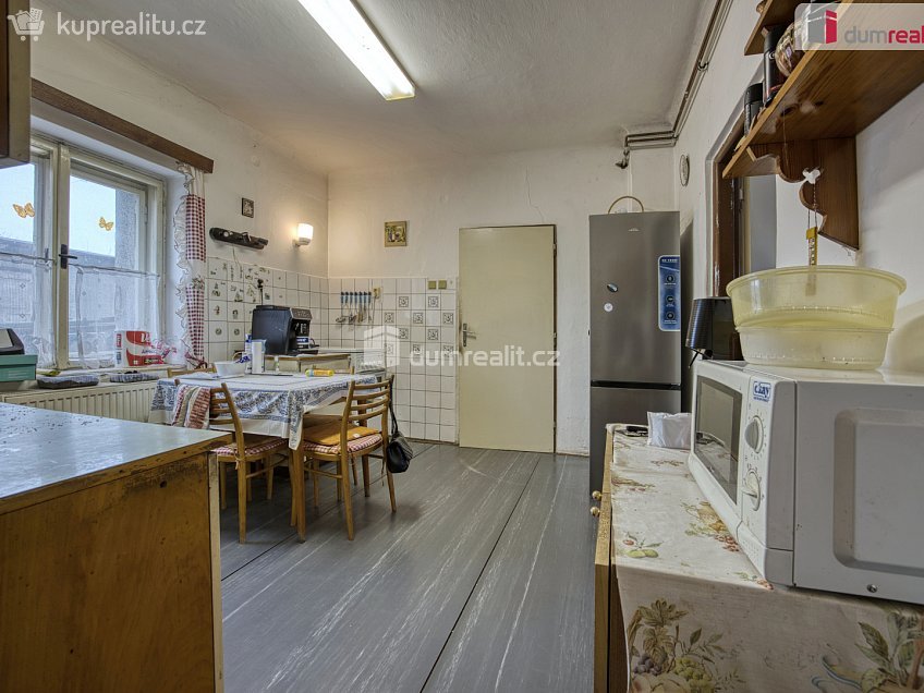 Prodej  rodinného domu 106 m^2 Zaříčanská, Praha 21 