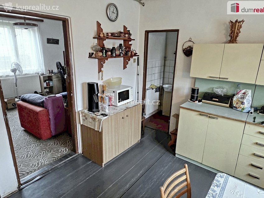 Prodej  rodinného domu 106 m^2 Zaříčanská, Praha 21 