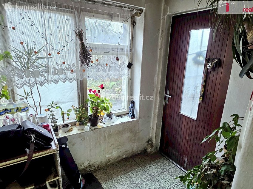 Prodej  rodinného domu 106 m^2 Zaříčanská, Praha 21 