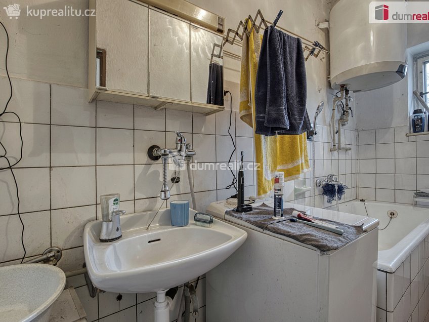 Prodej  rodinného domu 106 m^2 Zaříčanská, Praha 21 