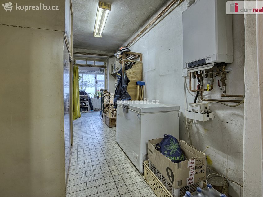 Prodej  rodinného domu 106 m^2 Zaříčanská, Praha 21 