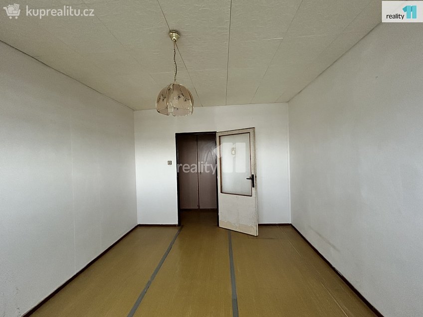 Prodej bytu 3+1 73 m^2 Běluňská, Praha 20 